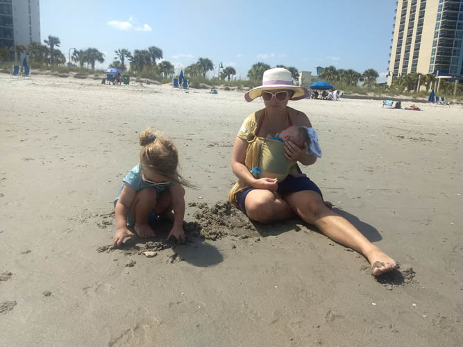 Toddlers and Beaches playing in the sand at myrtle beach sc